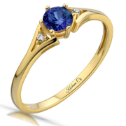 Pierścionek zaręczynowy złoty z granatową cyrkonią