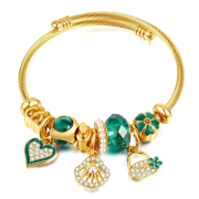 Bransoletka damska złota charmsy FUGTGB938